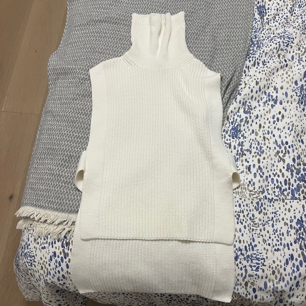 beige turtleneck with cutouts